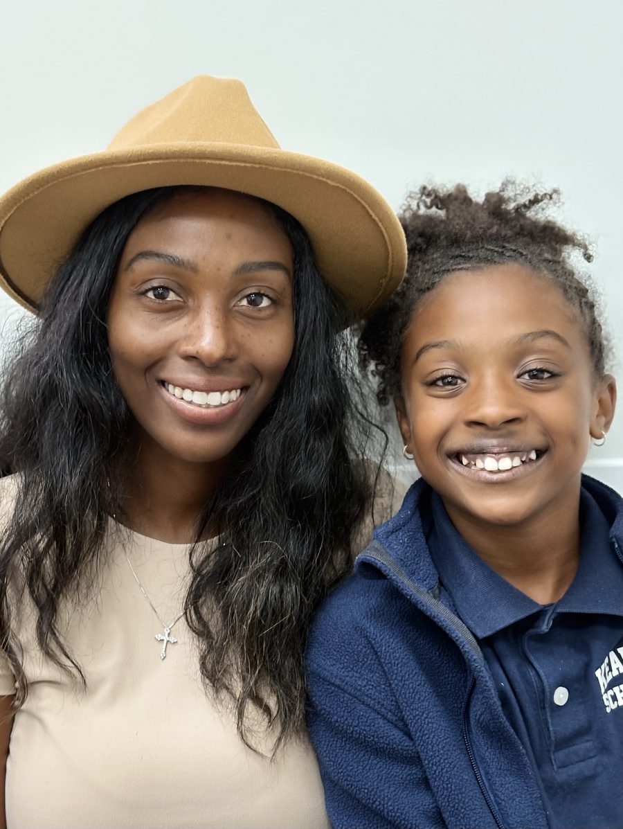 Parent and child smiling together at NA Orthodontics in North Arlington, NJ