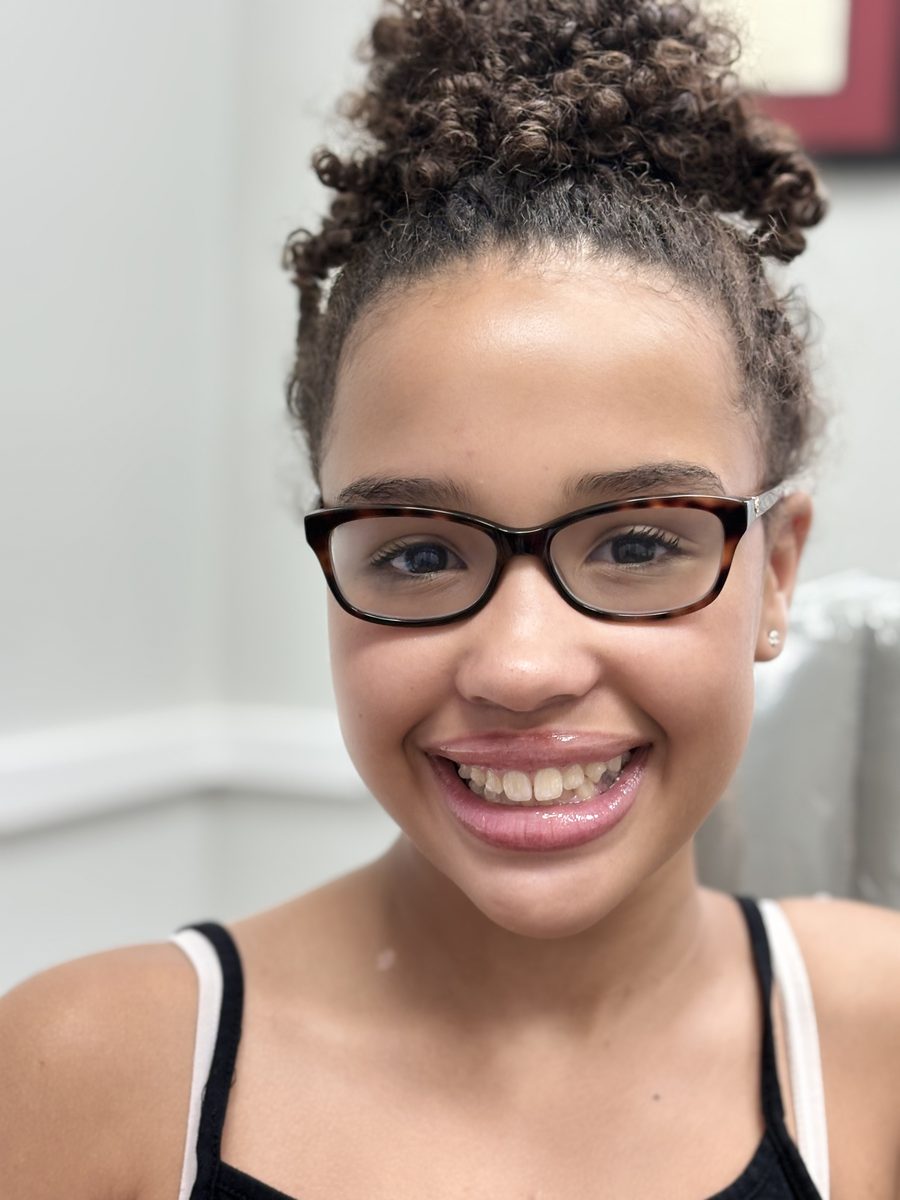Teen orthodontic patient smiling